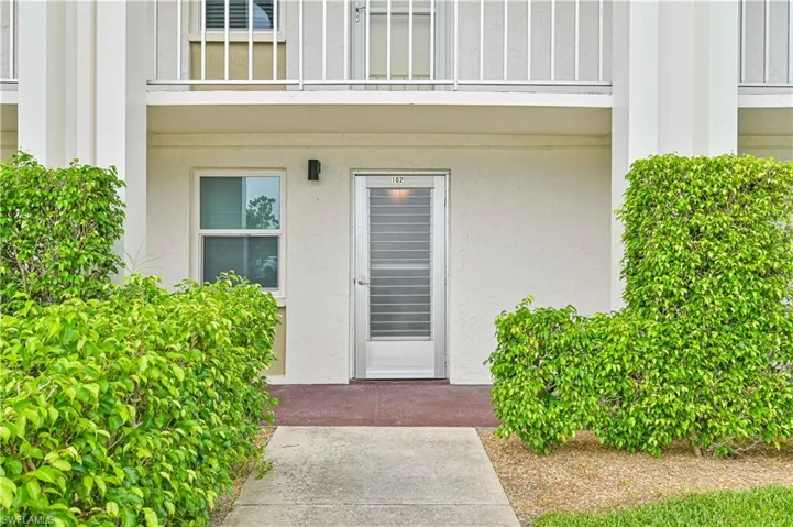 Doorway to property featuring a balcony