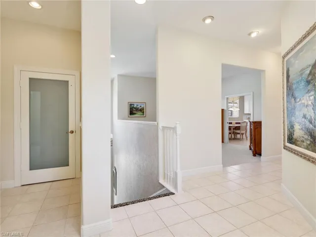 Top of stairs and 2nd floor elevator entrance on the left