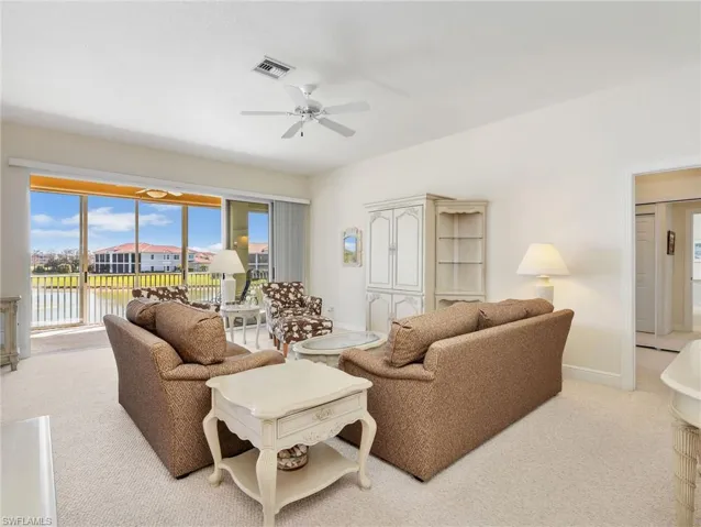 Family Room with pocket sliders to the Enclosed Lanai