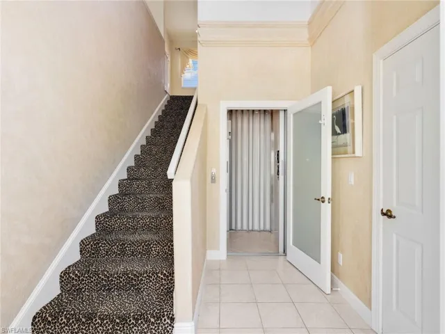 Front Door Entryway with Private Elevator and access to the Garage