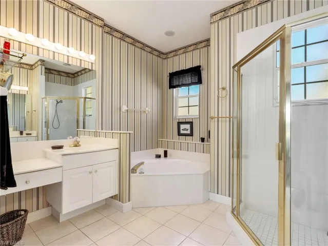 Primary Bathroom with Separate Tub and Shower