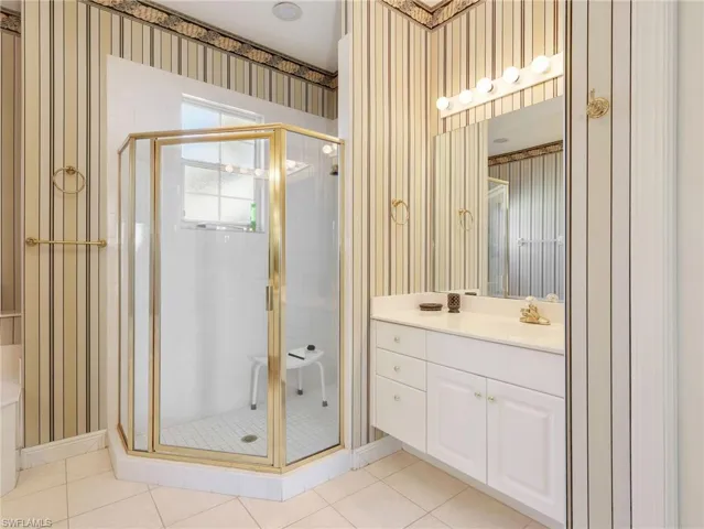 Primary Bathroom with Separate sinks and enclosed water closet