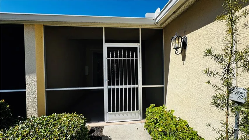 Covered entryway providing shade and protection from the FLorida sun.
