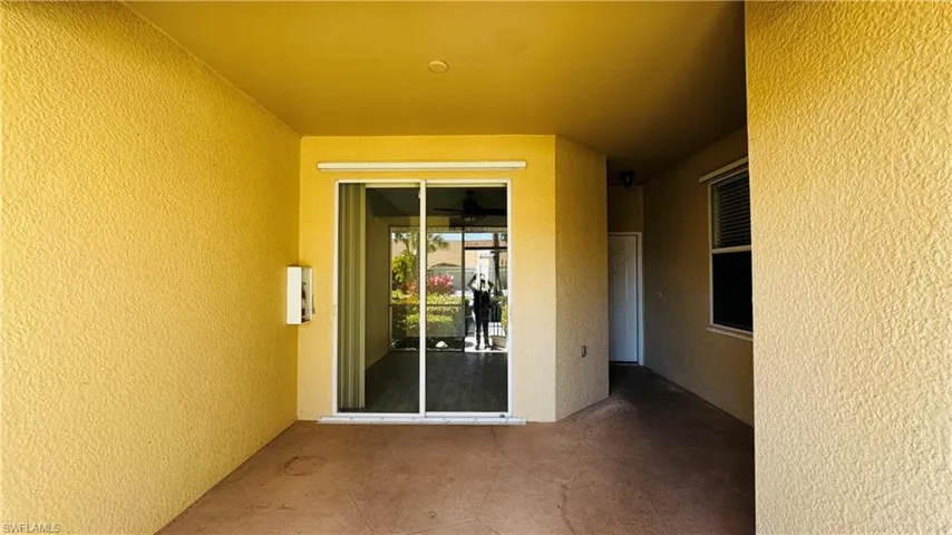 Covered patio area ideal for morning coffee or evening relaxation.