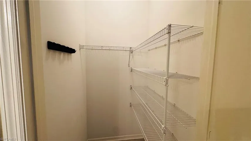Generous closet space with built in shelving.