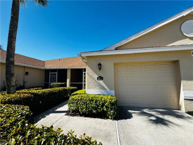 Inviting front entry with covered walkway.