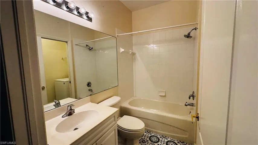 Spacious bathroom vanity with amplecounter space.
