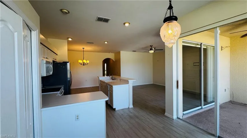 Open kitchen layout connecting beautifully with the living areas.