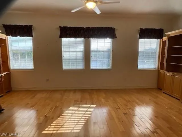 Unfurnished room featuring light wood-flooring