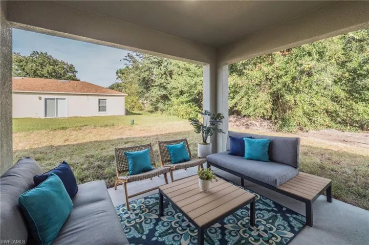 View of patio with an outdoor lounge area