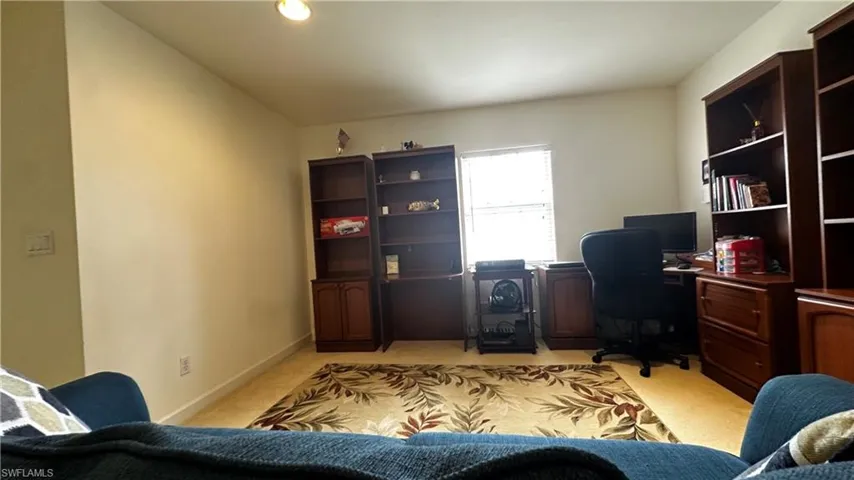 View of carpeted home office