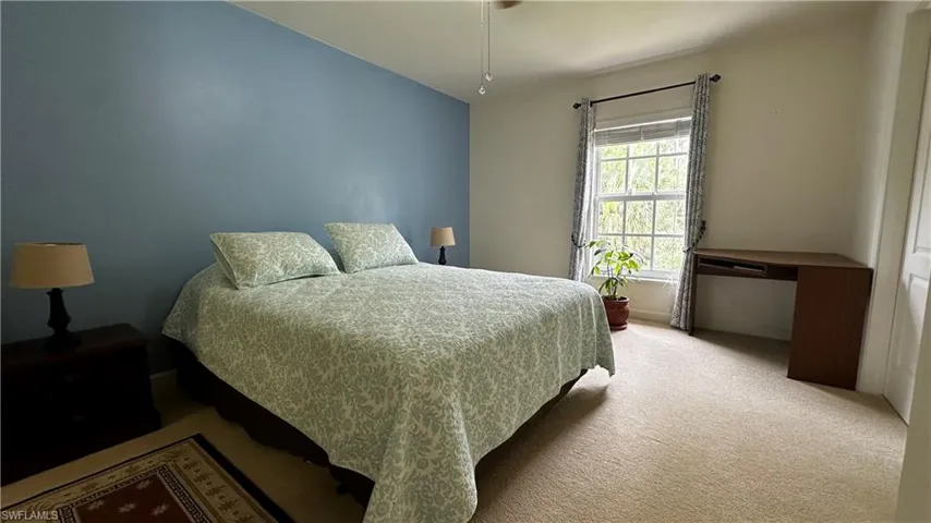 Bedroom featuring carpet flooring