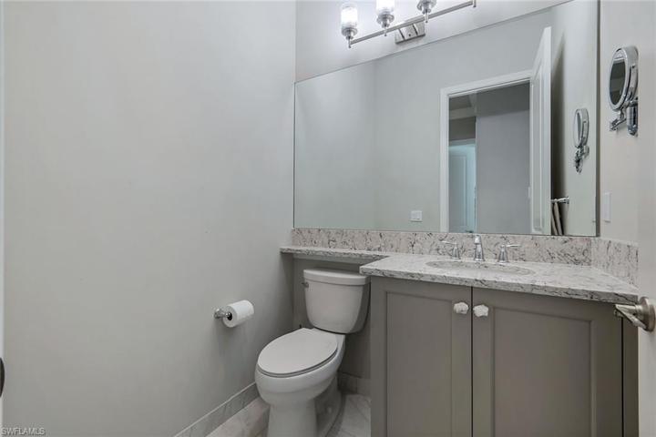 Powder bath is located just off the kitchen.