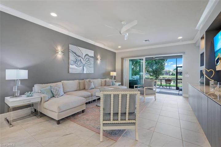 Porcelain tile throughout, volume ceilings & open great room all overlooking a beautiful lake view....