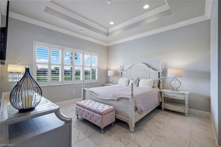 Large primary suite offers views of the lake.