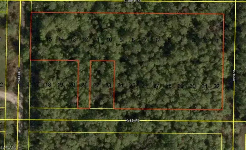 Aerial view of property's location featuring property parcel outlined