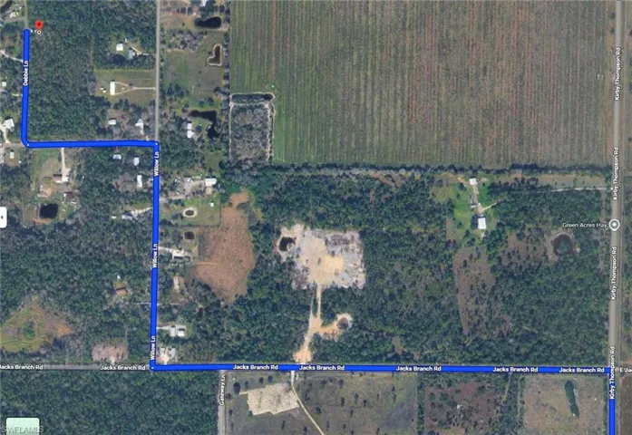 Aerial map of property and surrounding area with property boundaries highlighted