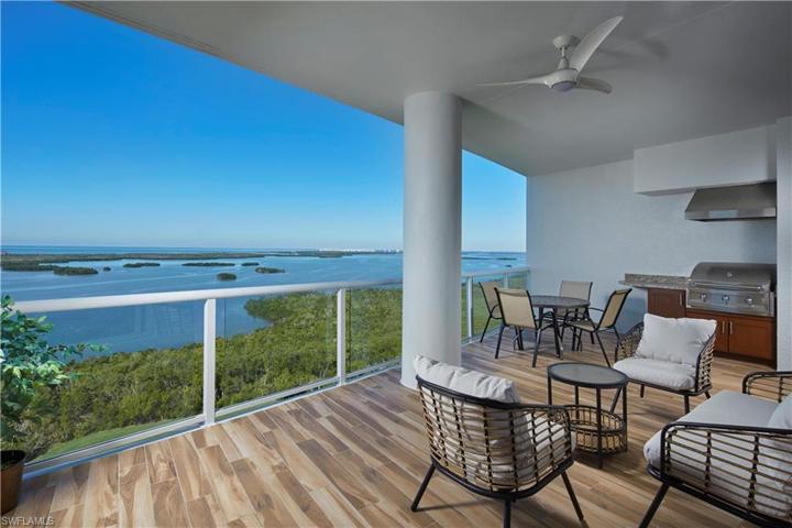 Expansive, wide water views of Hickory Island, Sanibel, Estero Island and more await you at your new home in the recently built Seaglass high-rise building of Bonita Bay!