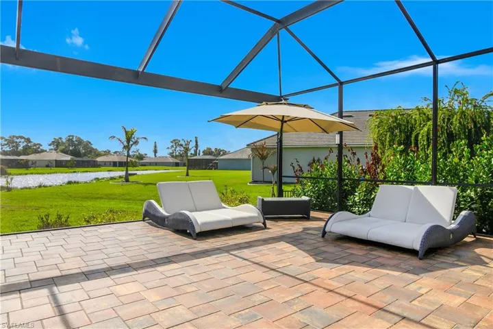 Screen lanai provides unobstructed views and numerous nooks for relaxing in the SW Florida sunshine.