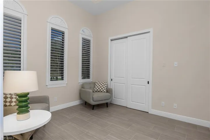 Guest bedroom #3 includes ample storage with a large closet.