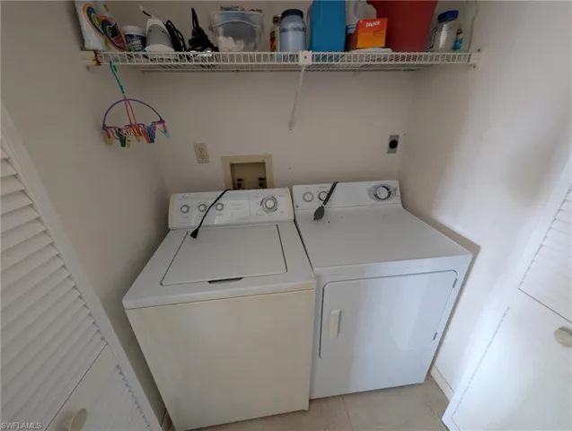 Laundry area featuring independent washer and dryer