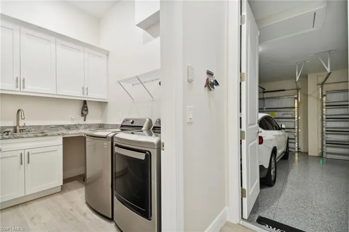 Full Laundry with Sink and Cabinets