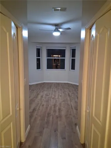 Hall with wood finished floors