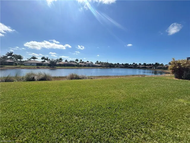 Water view with nearby suburban area