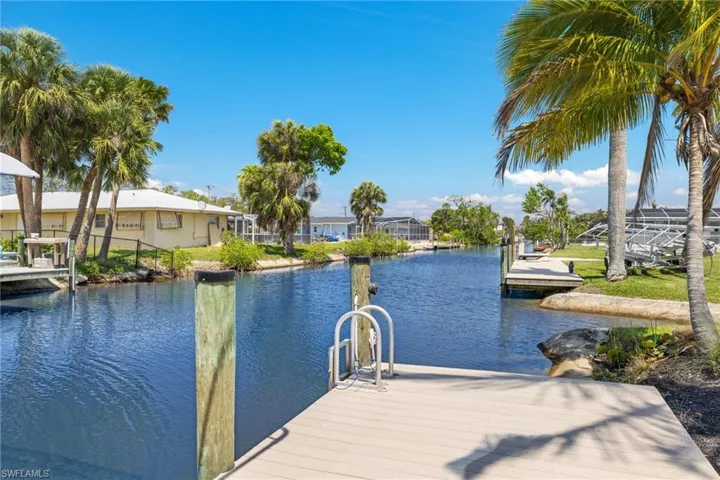 36' long x 9' wide composite dock, newly built in 2020.  Features 10,000lb boat lift with cover.  Separate PWC floating dock also included.