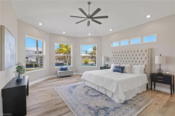 With large bay windows overlooking canal