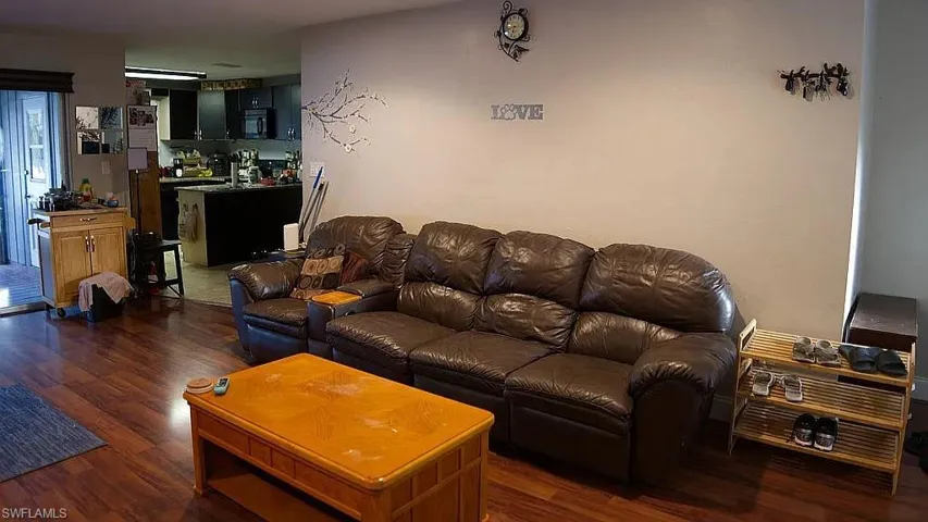 Living area featuring wood finished floors