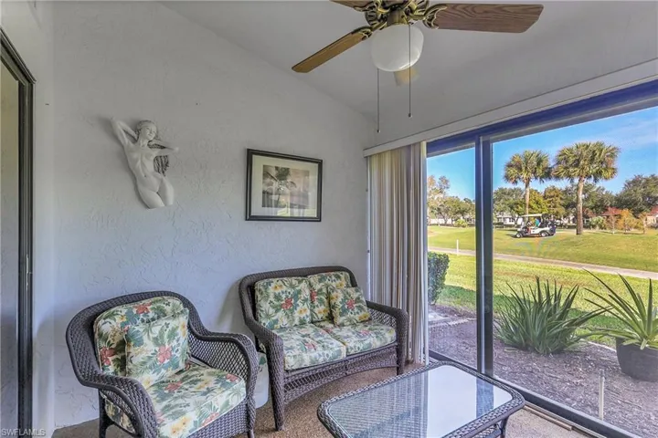 Sunroom with lofted ceiling