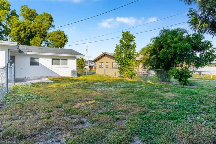 Fenced backyard featuring a patio area