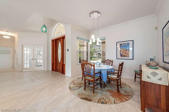 Formal dining area with formal living area.
