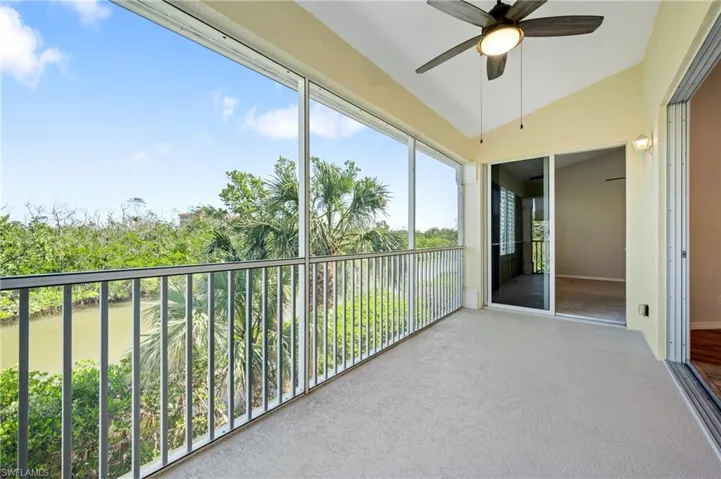 Unfurnished lanai featuring ceiling fan
