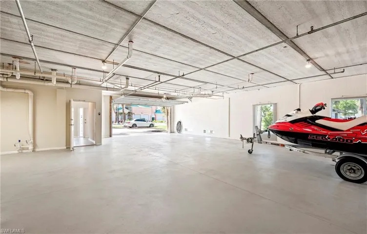 View of garage with space for six cars