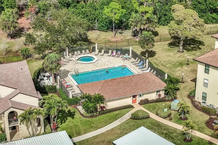 Aerial view of adult pool & spa conveniently located near condo.