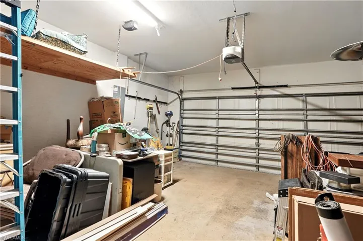ChatGPT said:Spacious two-car garage with ample room for vehicles, tools, and storage. Features built-in shelving and overhead racks to keep belongings organized, plus durable concrete flooring for easy maintenance. Perfect for hobbyists, DIY projects, or extra storage, this versatile space adds practicality and convenience to the home.
