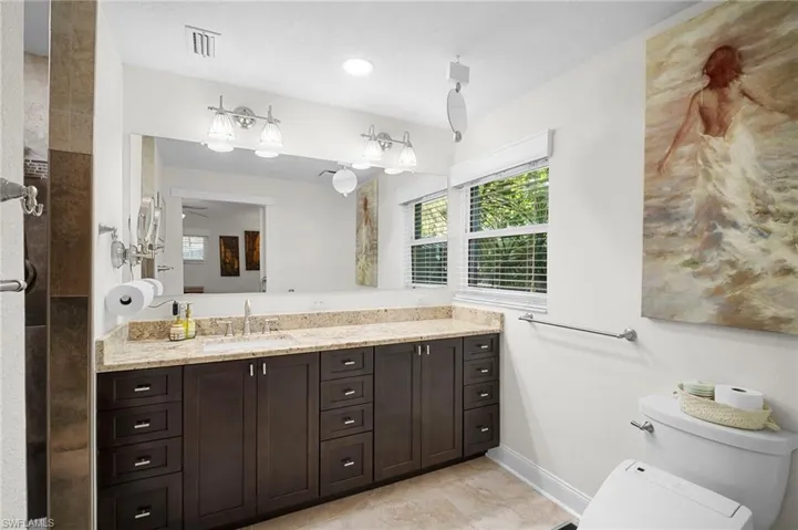 Full bath with vanity and walk in shower