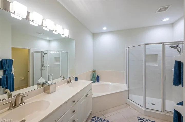 Primary en suite offers separate tub and shower and 2 sinks!