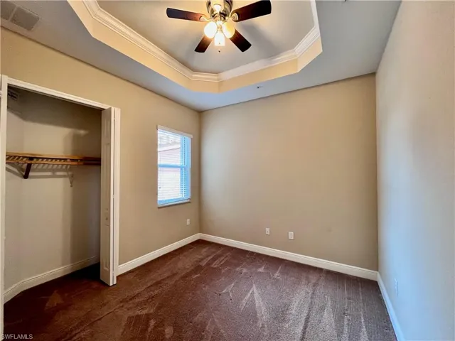 Flex space could be used as a den or as a bedroom, French doors, a tray ceiling, ceiling fan, and a closet