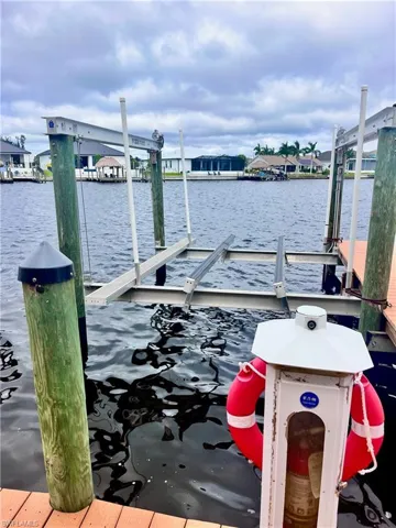 Dock with a water view and boat lift to rent