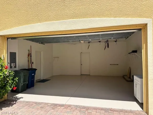 2 Car Garage with a storage closet