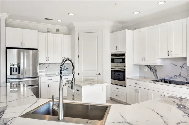 A bright modern kitchen that is a true delight to gather around