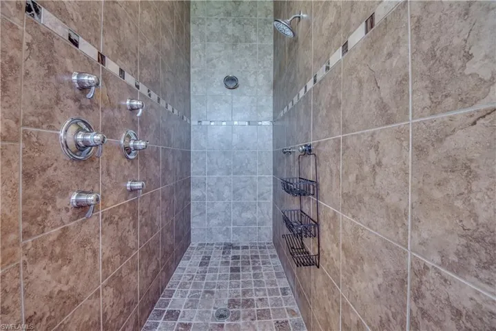 Bathroom with a tile shower