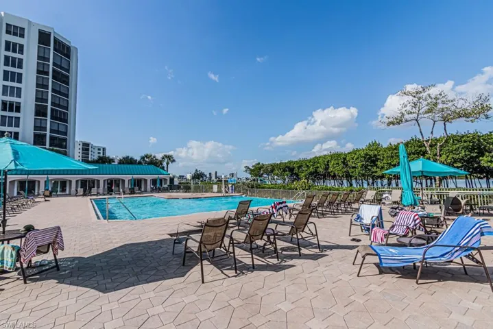 Community pool with a patio area