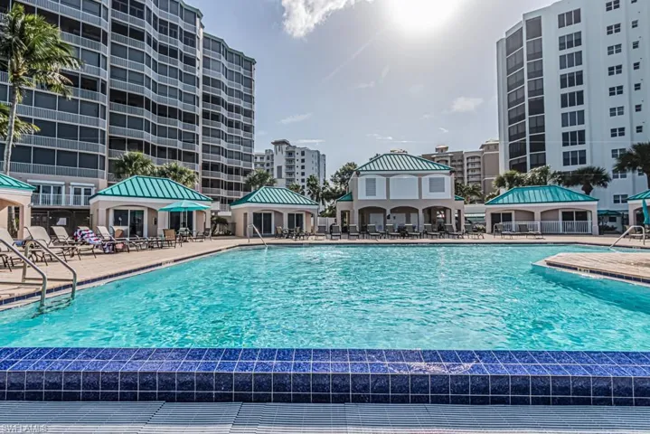 Community pool with a gazebo and a patio area