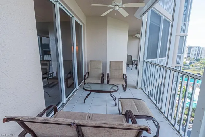 Balcony featuring a ceiling fan