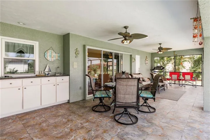 View of patio with ceiling fan