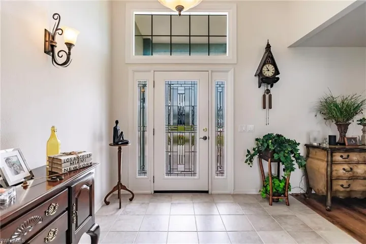 Foyer featuring light tile floors